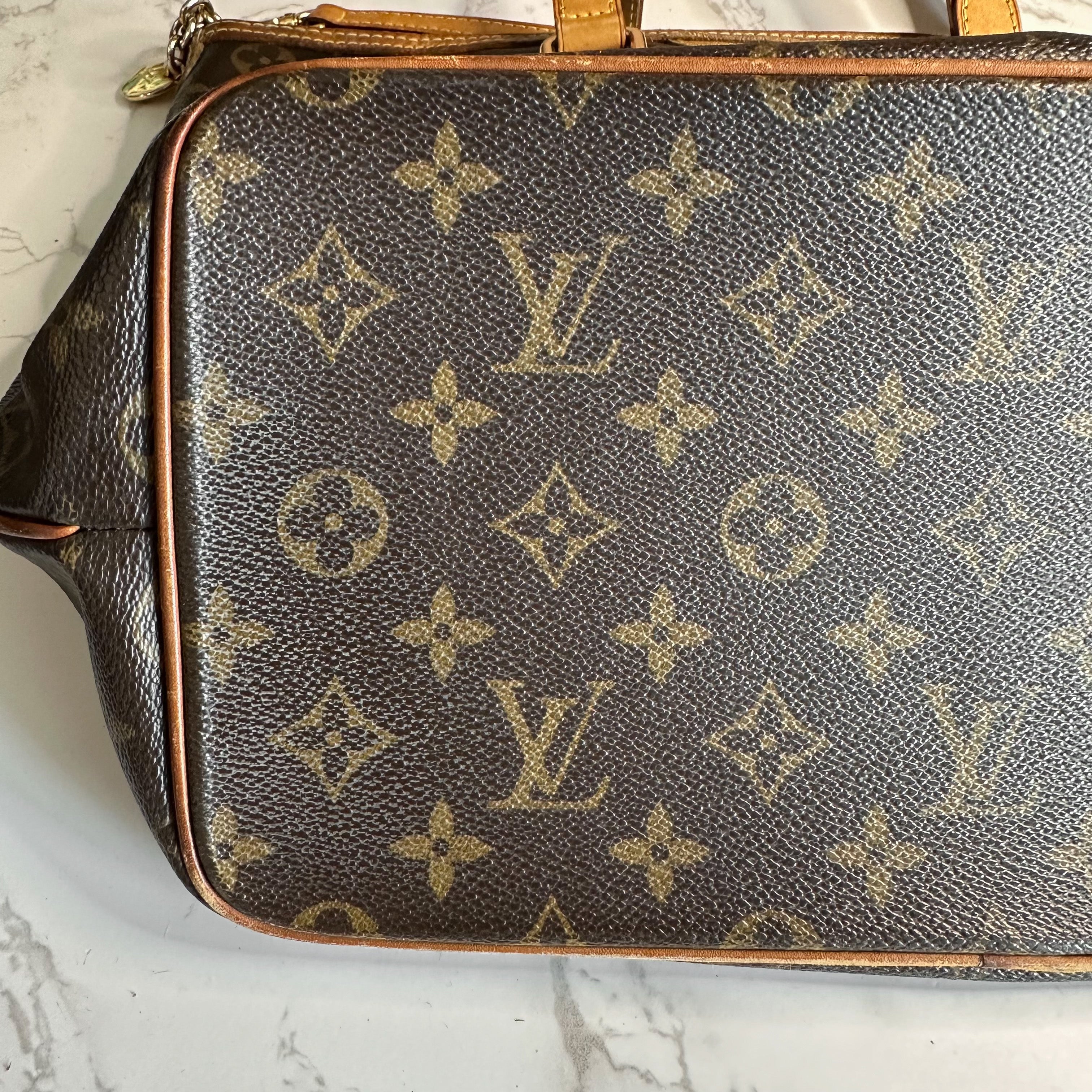 Louis Vuitton Palermo bag in monogram canvas and natural leather